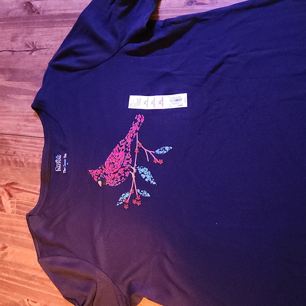 Long sleeve black cardinal t.   Brand new with tags.
